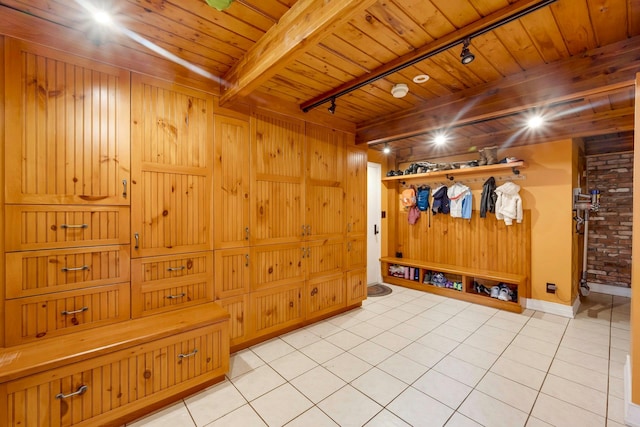 38A Claremont Rd, Scarsdale, NY 10583 - mudroom featuring rail lighting, wood ceiling, wooden walls, beam ceiling, and baseboards