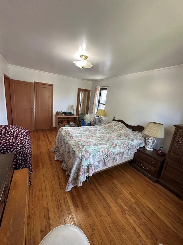 bedroom with light wood-type flooring
