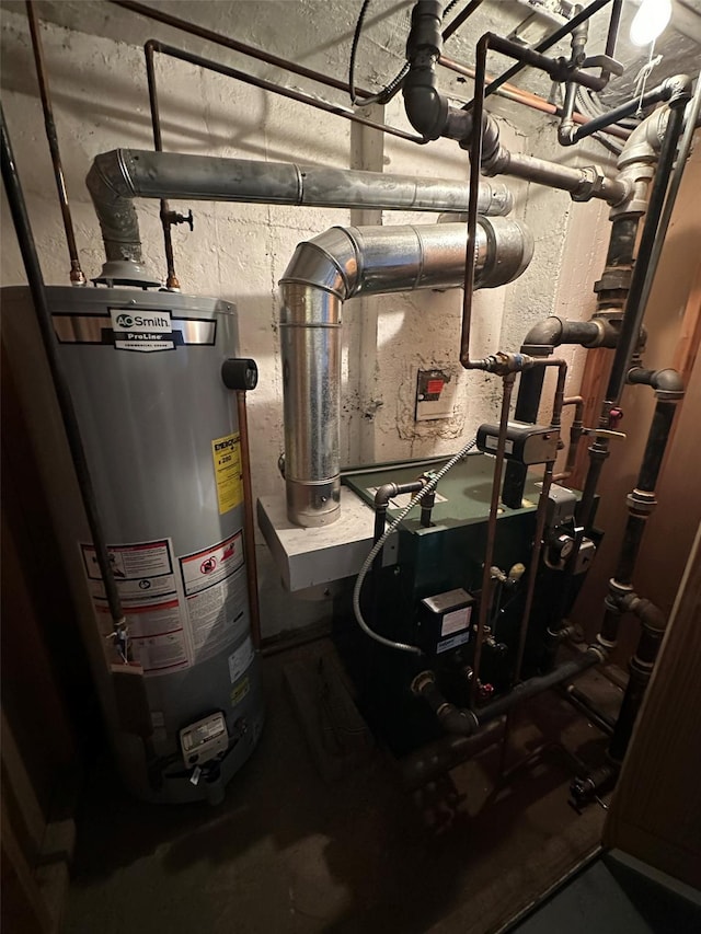 utility room featuring gas water heater