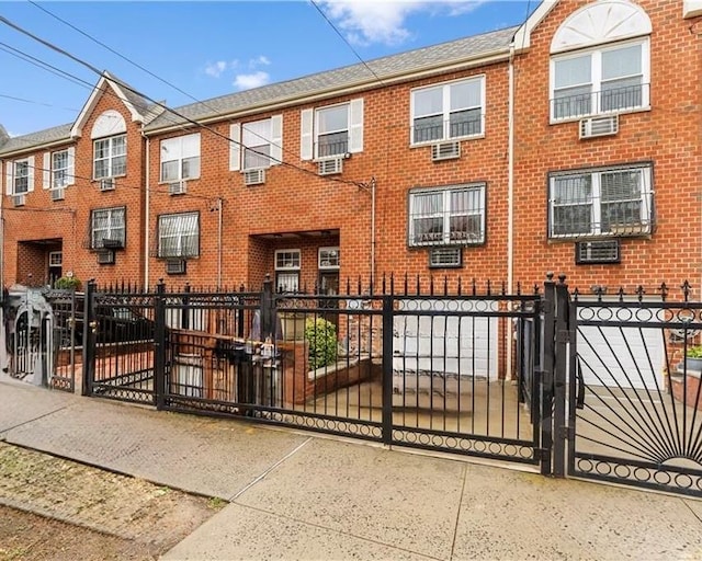 643 Underhill Ave, Bronx, NY 10473 - view of front of home with brick siding and a fenced front yard