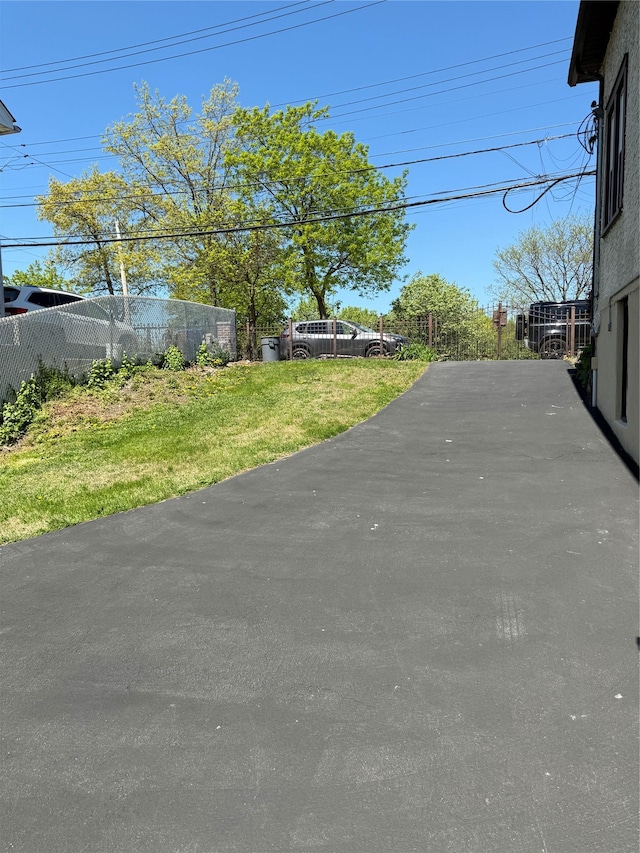 view of road with driveway