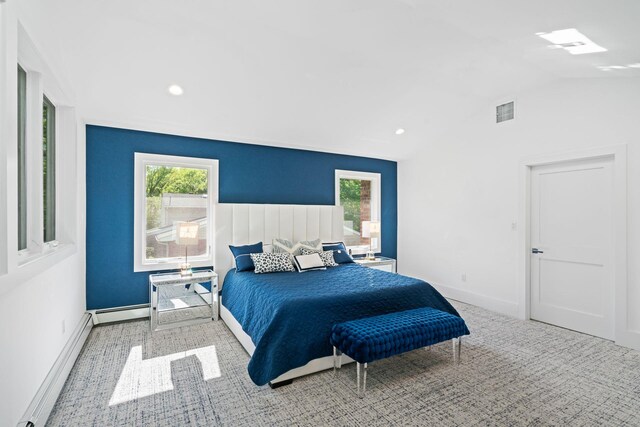 carpeted bedroom featuring vaulted ceiling, baseboard heating, a baseboard heating unit, baseboards, and recessed lighting