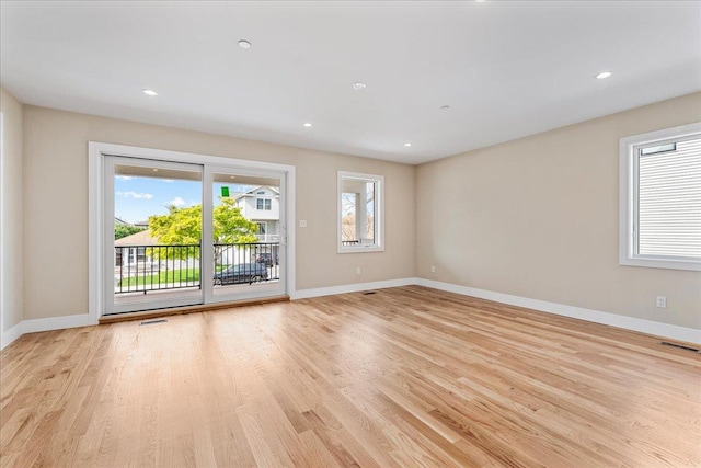 56 Oregon St, Long Beach, NY 11561 - empty room featuring baseboards, visible vents, and light wood-style flooring