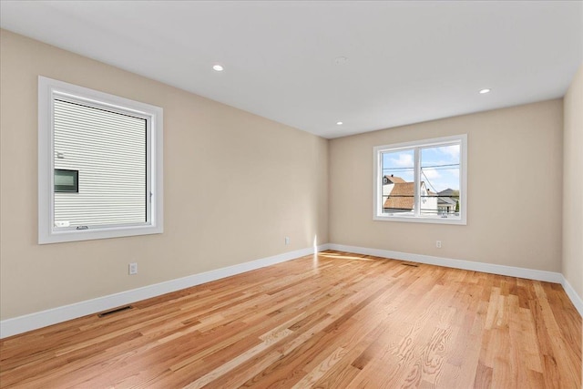 56 Oregon St, Long Beach, NY 11561 - unfurnished room with recessed lighting, baseboards, visible vents, and light wood-style floors