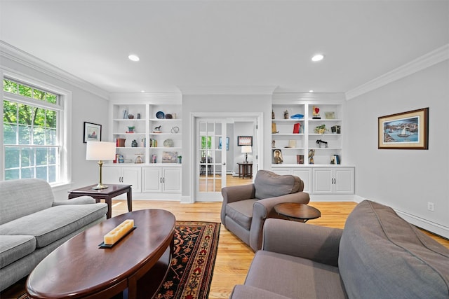 30 Warwick Lake Pkwy, Warwick, NY 10990 - living area featuring healthy amount of natural light, built in shelves, crown molding, recessed lighting, and light wood-type flooring