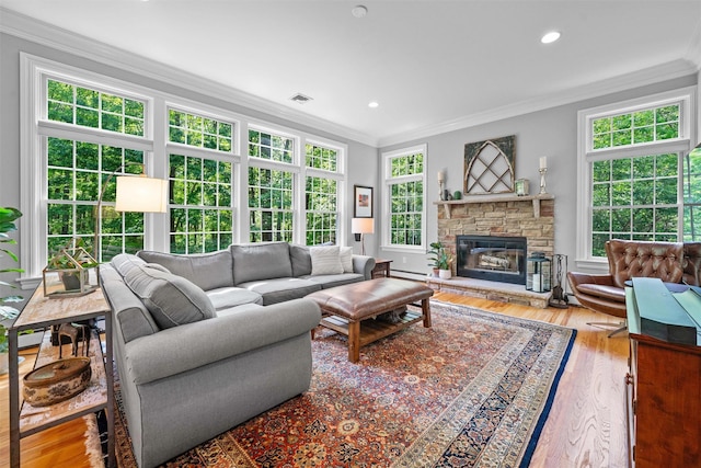 30 Warwick Lake Pkwy, Warwick, NY 10990 - living room featuring ornamental molding, wood finished floors, a fireplace, a baseboard heating unit, and recessed lighting