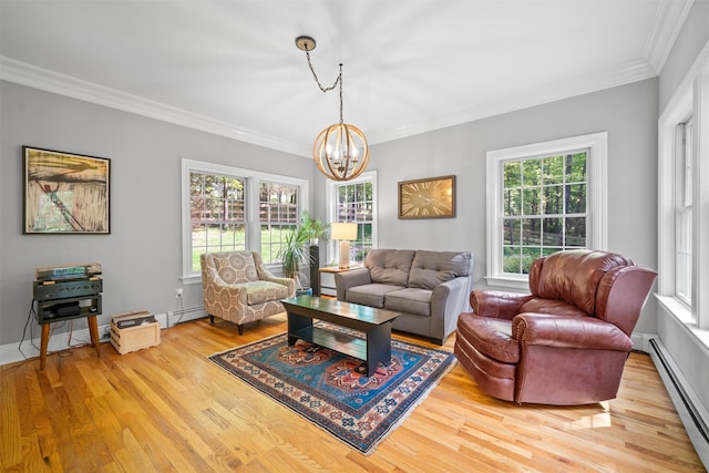 30 Warwick Lake Pkwy, Warwick, NY 10990 - living room featuring a baseboard heating unit, a chandelier, plenty of natural light, wood finished floors, and ornamental molding