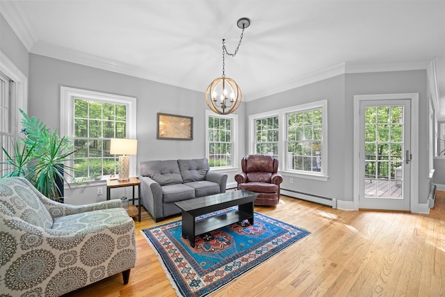 30 Warwick Lake Pkwy, Warwick, NY 10990 - living room featuring a baseboard heating unit, a chandelier, wood finished floors, crown molding, and baseboard heating
