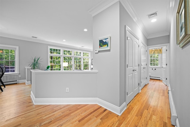 30 Warwick Lake Pkwy, Warwick, NY 10990 - hall with light wood-style flooring, a baseboard heating unit, crown molding, a baseboard radiator, and baseboards