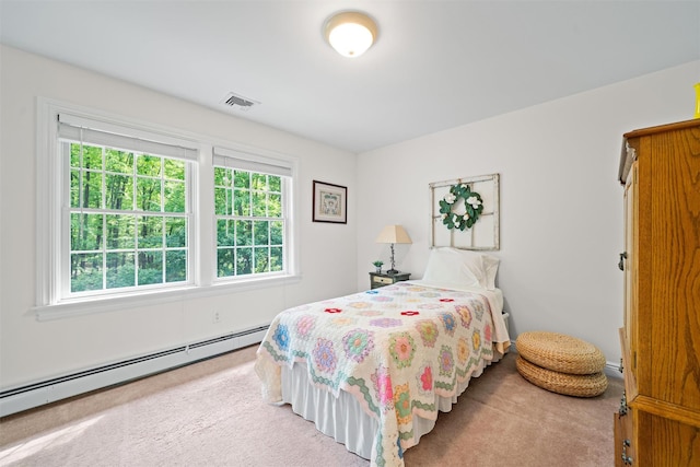 30 Warwick Lake Pkwy, Warwick, NY 10990 - bedroom featuring a baseboard heating unit and carpet