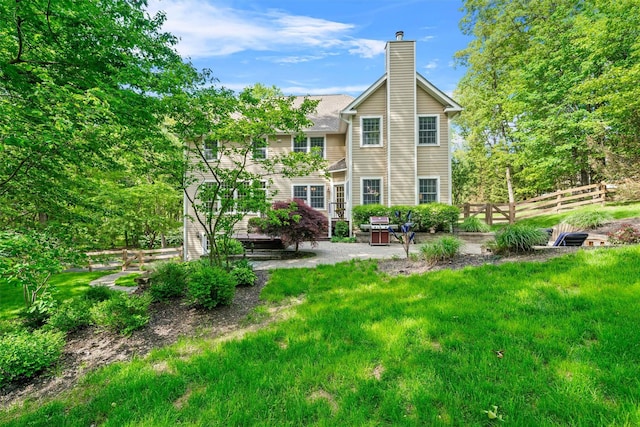 30 Warwick Lake Pkwy, Warwick, NY 10990 - rear view of property featuring a patio and a chimney
