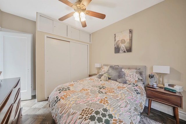bedroom featuring a ceiling fan and a closet