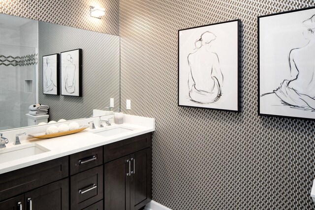 1239 Old Nichols Rd Unit 46, Islandia, NY 11749 - full bathroom with a sink, wallpapered walls, and double vanity