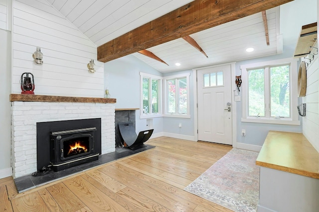 living room featuring hardwood / wood-style floors, baseboards, plenty of natural light, wooden ceiling, and recessed lighting