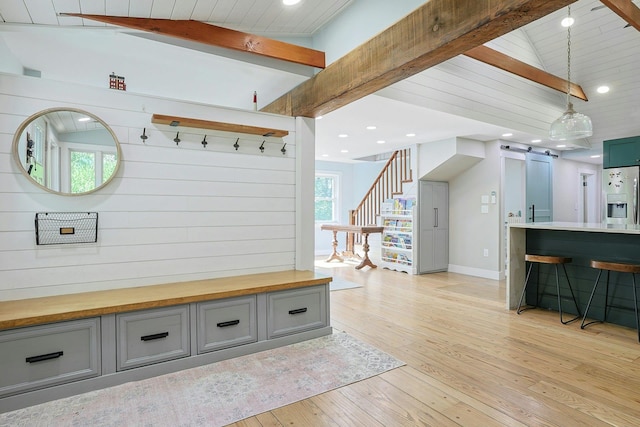 mudroom featuring light wood-style floors, recessed lighting, and baseboards