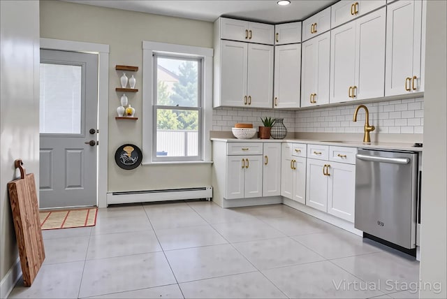 71 Lenox Ave, Congers, NY 10920 - kitchen with dishwasher, a baseboard radiator, light countertops, and decorative backsplash