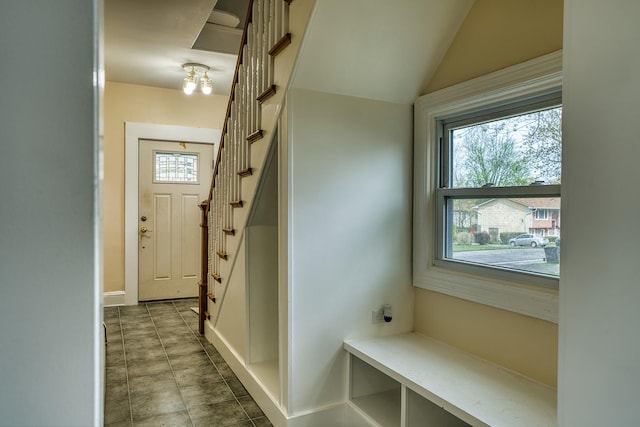 71 Lenox Ave, Congers, NY 10920 - mudroom featuring vaulted ceiling, baseboards, and tile patterned flooring