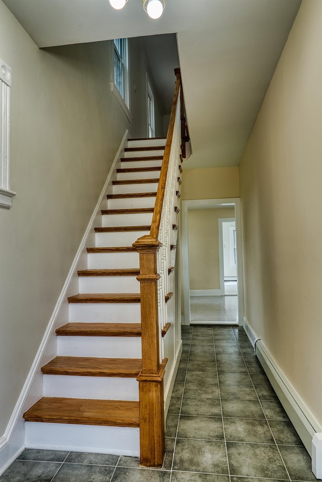 71 Lenox Ave, Congers, NY 10920 - staircase with baseboard heating and baseboards