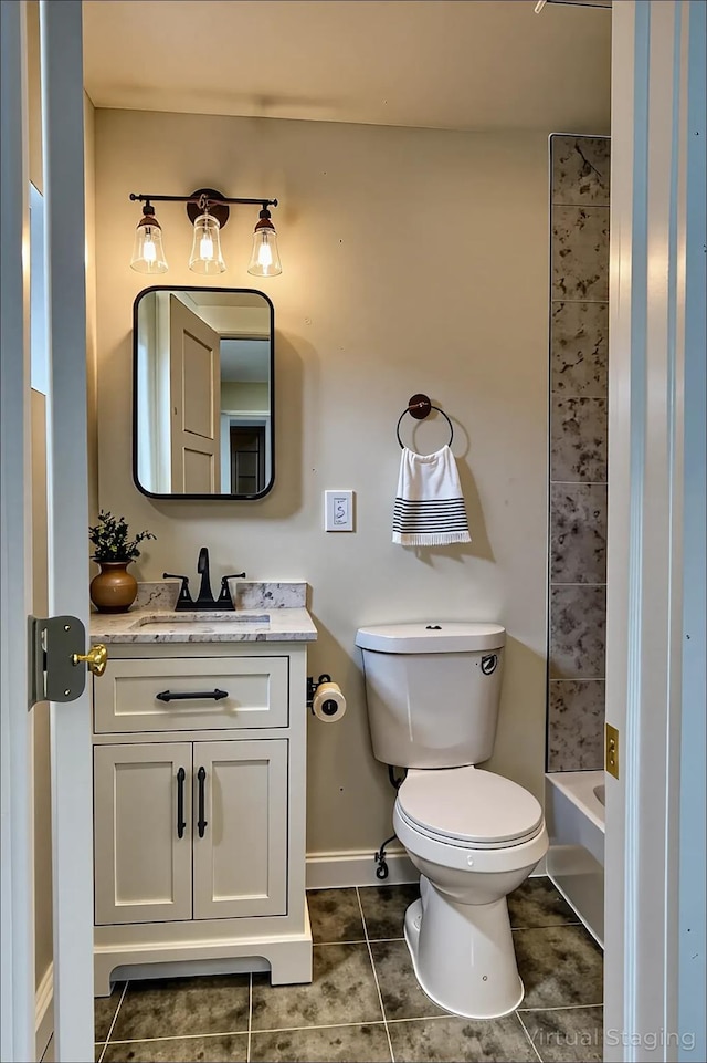 71 Lenox Ave, Congers, NY 10920 - full bathroom featuring vanity, tile patterned floors, toilet, baseboards, and  shower combination