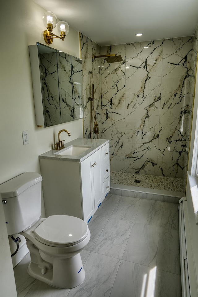 71 Lenox Ave, Congers, NY 10920 - full bathroom with a baseboard heating unit, vanity, toilet, and a marble finish shower