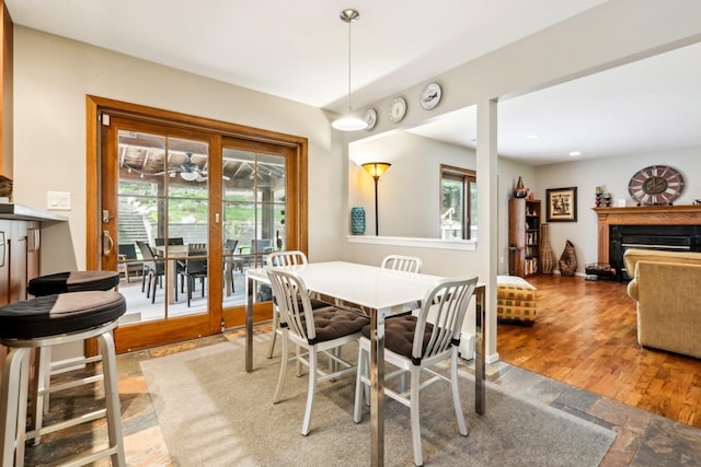 dining space featuring a fireplace