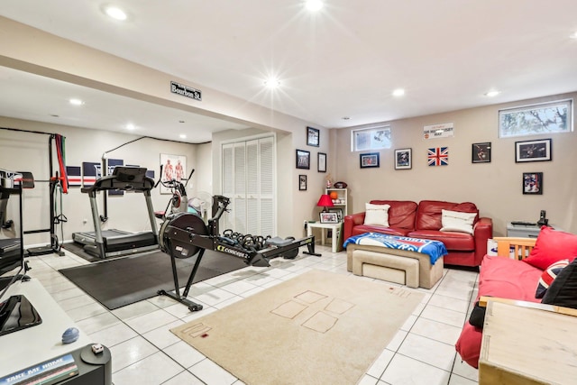 workout area featuring recessed lighting and tile patterned floors