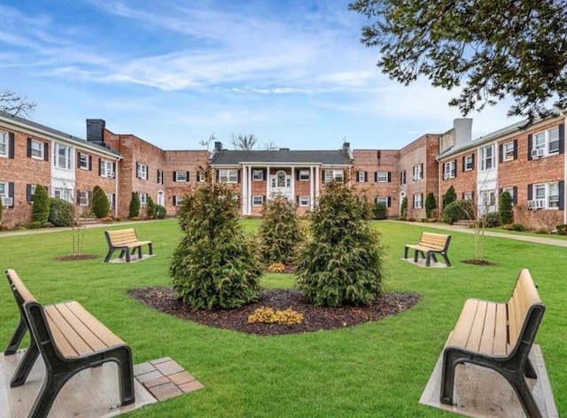 261 Central Ave Unit E4, Lawrence, NY 11559 - view of home's community with a lawn and a residential view