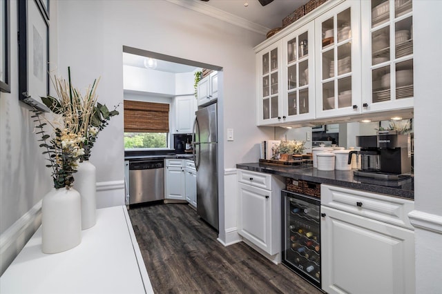 261 Central Ave Unit E4, Lawrence, NY 11559 - bar featuring beverage cooler, crown molding, dark wood-style flooring, and appliances with stainless steel finishes