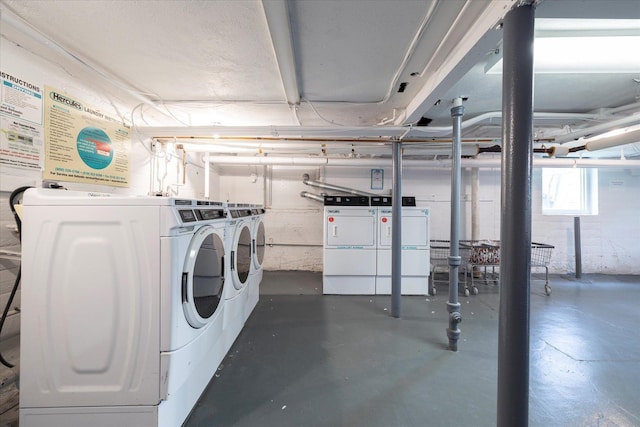 261 Central Ave Unit E4, Lawrence, NY 11559 - basement featuring washing machine and clothes dryer