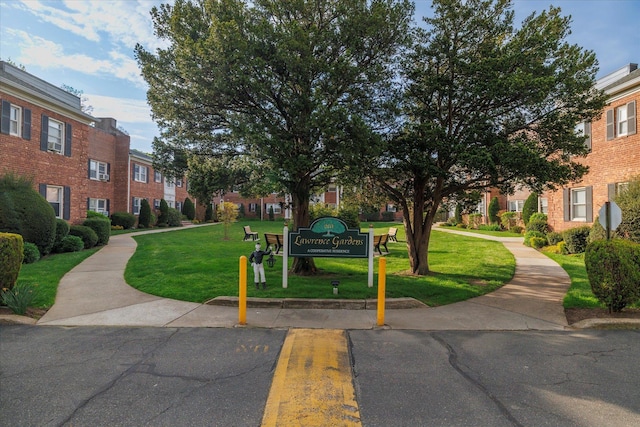 261 Central Ave Unit E4, Lawrence, NY 11559 - view of community featuring a yard and a residential view