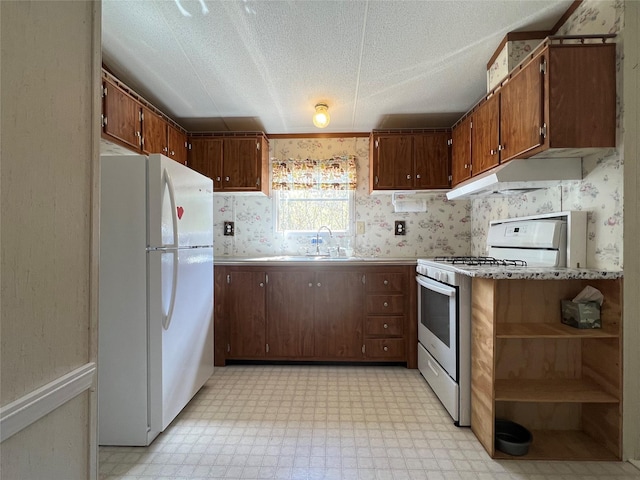 kitchen with open shelves, light floors, a sink, and white appliances