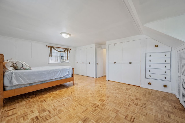 bedroom with two closets