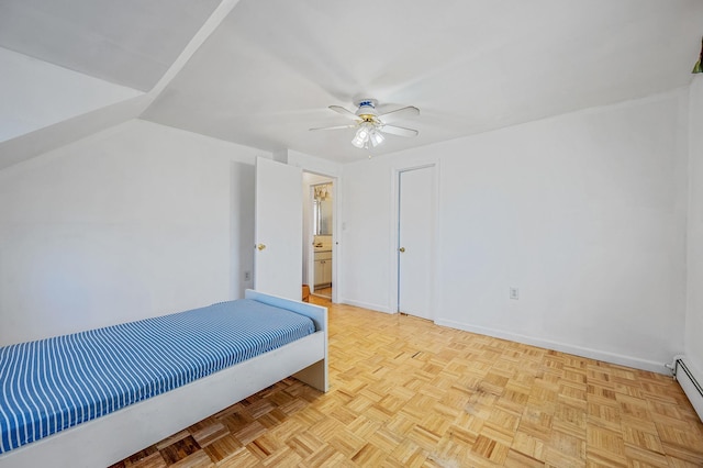 unfurnished bedroom featuring baseboards and a ceiling fan