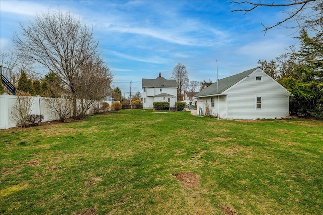 view of yard with fence