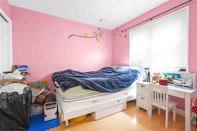 58-37 246th Cres Unit 1F, Little Neck, NY 11362 - bedroom with wood finished floors
