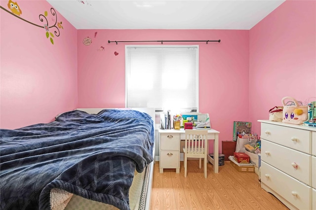 58-37 246th Cres Unit 1F, Little Neck, NY 11362 - bedroom featuring light wood finished floors