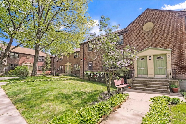 58-37 246th Cres Unit 1F, Little Neck, NY 11362 - view of building exterior with a residential view and entry steps