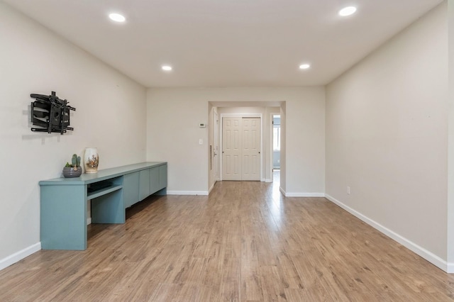 entryway featuring recessed lighting, baseboards, and light wood-type flooring