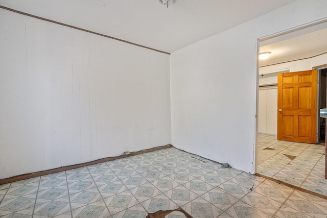 spare room with light floors