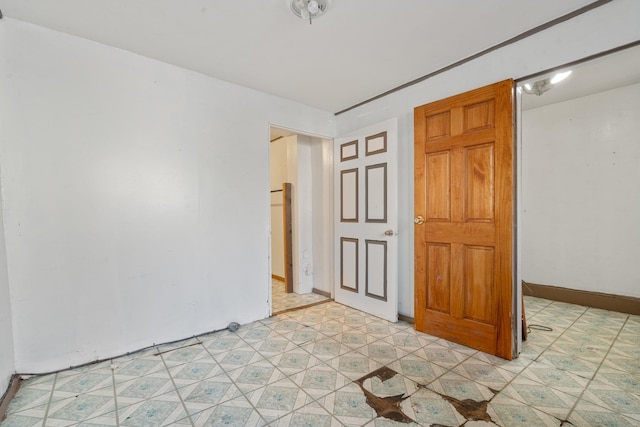 empty room featuring light floors