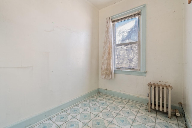 spare room with radiator