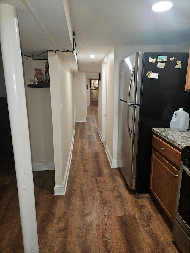 355 Ridgewood Ave, Brooklyn, NY 11208 - kitchen featuring dark wood-type flooring, range, baseboards, and freestanding refrigerator