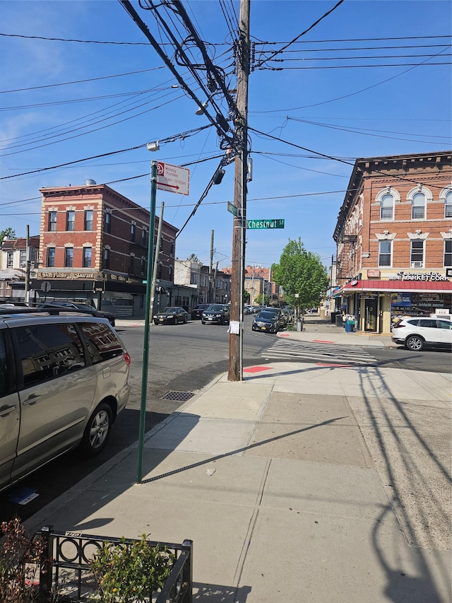 355 Ridgewood Ave, Brooklyn, NY 11208 - view of asphalt road featuring street lighting and sidewalks