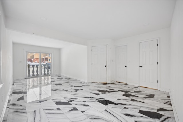 empty room with baseboards