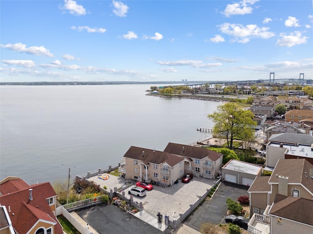 aerial view with a water view and a residential view