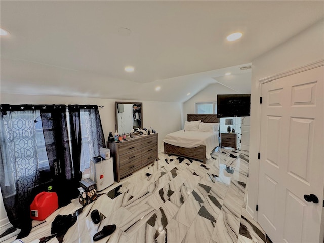 bedroom featuring vaulted ceiling, recessed lighting, and visible vents