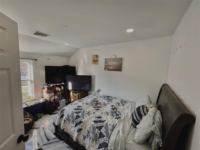 bedroom featuring visible vents, recessed lighting, and lofted ceiling