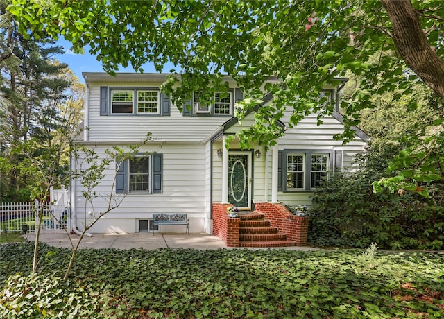 8 Rose Ct, Northport, NY 11768 - view of front facade featuring fence and a patio area