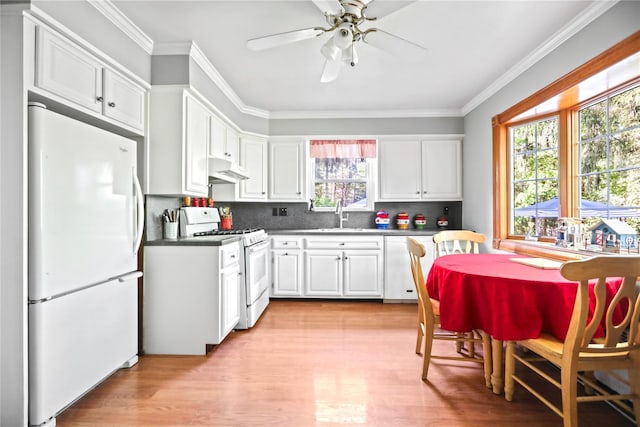 8 Rose Ct, Northport, NY 11768 - kitchen featuring white appliances, white cabinets, ornamental molding, and light wood-style flooring