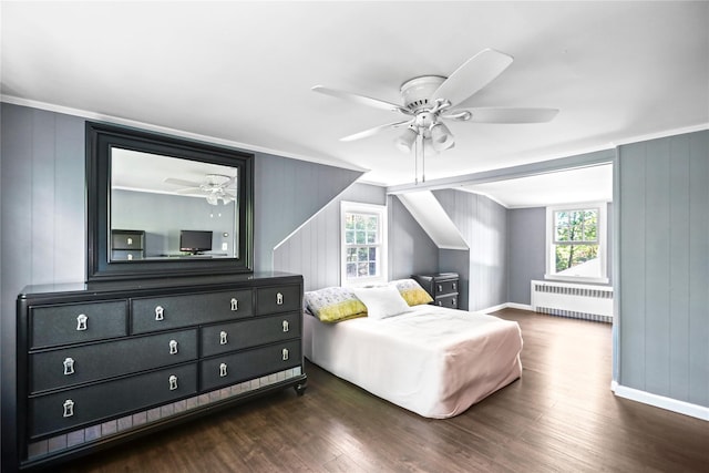 8 Rose Ct, Northport, NY 11768 - bedroom with ornamental molding, radiator, wood finished floors, baseboards, and ceiling fan